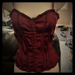 Super pretty satin like corset top.